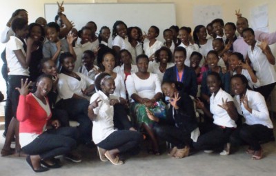 Carmen surrounded by the students relocated to Kigali Campus